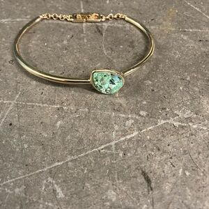 Elegant Gold Bracelet with Green Gemstone